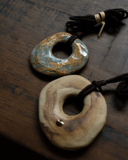 Cosmic Ring pendants