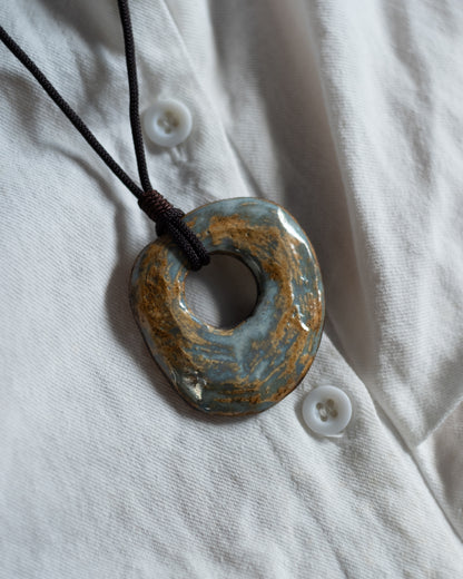 Cosmic Ring pendants